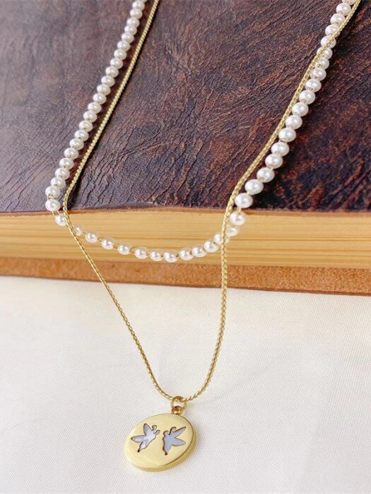 Collier avec pendentif disque de perles classique et élégant